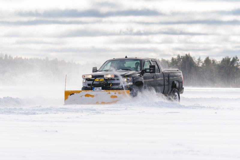 Pickup truck with a snow plow